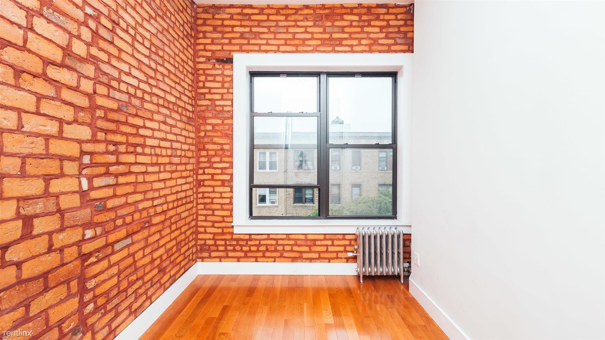 Building Photo - 61-36 Woodbine St