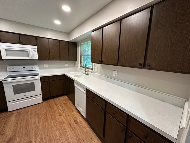 Large kitchen with Refrigerator, stove, microwave, dishwasher, disposal, and lots of counter space. - 2154 Willowgrove Ave