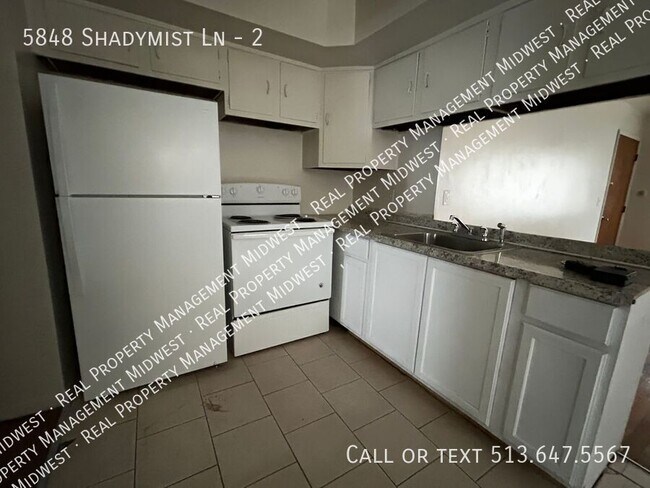 Foto del edificio - 5848 Shadymist Ln