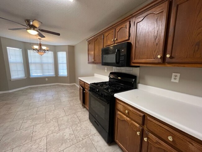 Building Photo - Renovated 4 Bedroom 2 Bath Home with 2 Car...