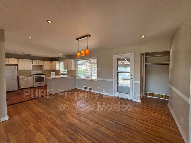 Building Photo - 1601 N Chaco Ave