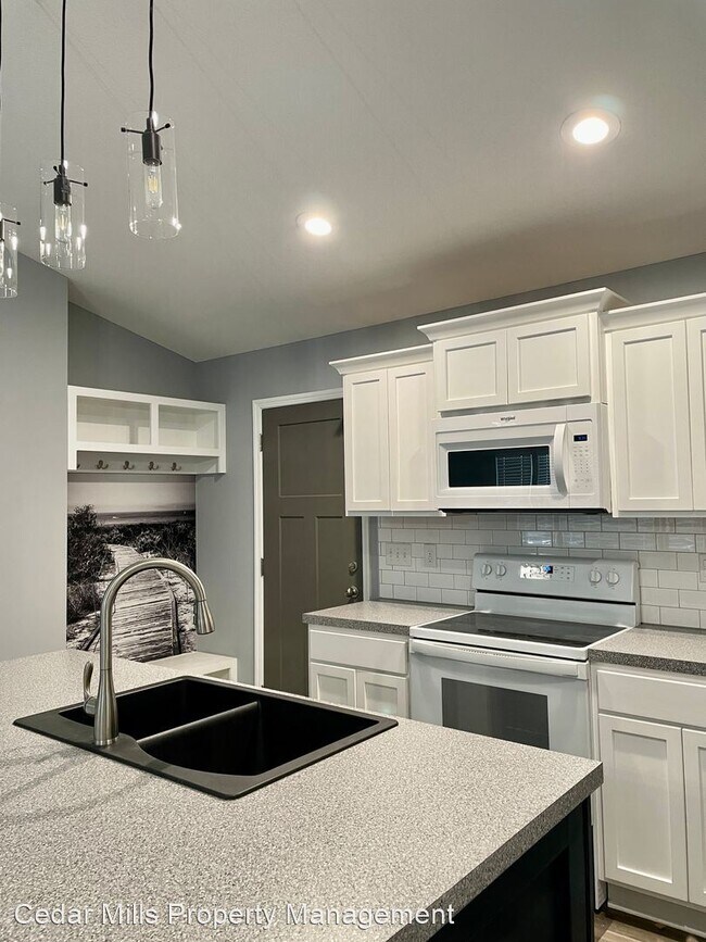 Foto del edificio - 4 br, 3 bath House - 3463 N Hickam Ct.