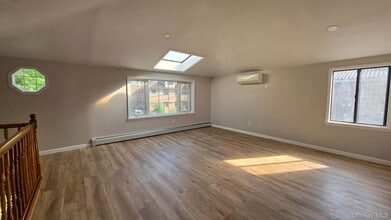 Building Photo - 206-66 46th Ave