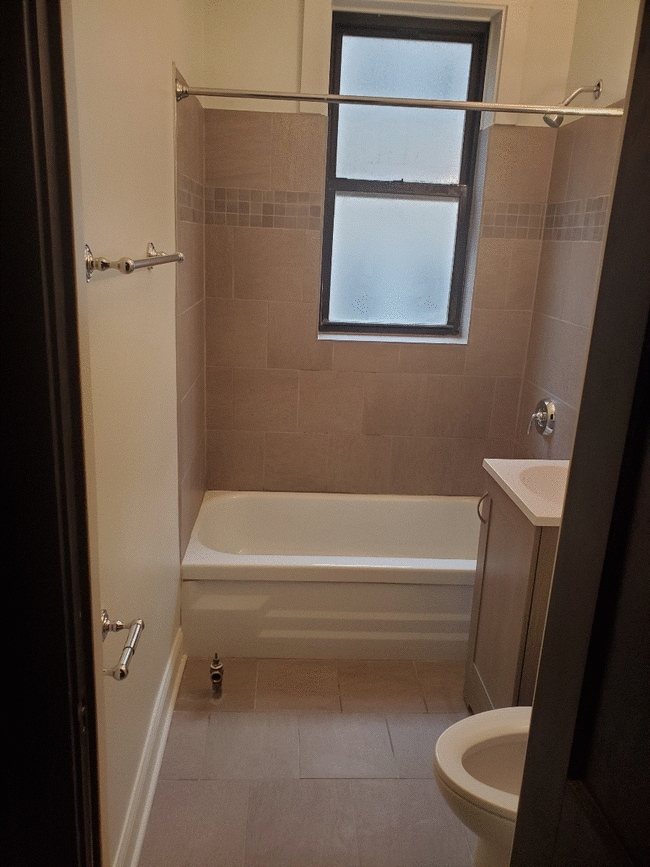 Newly renovated bath - 3518 N Broadway St