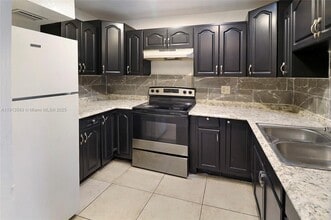 Building Photo - 5975 NW 25th Ct