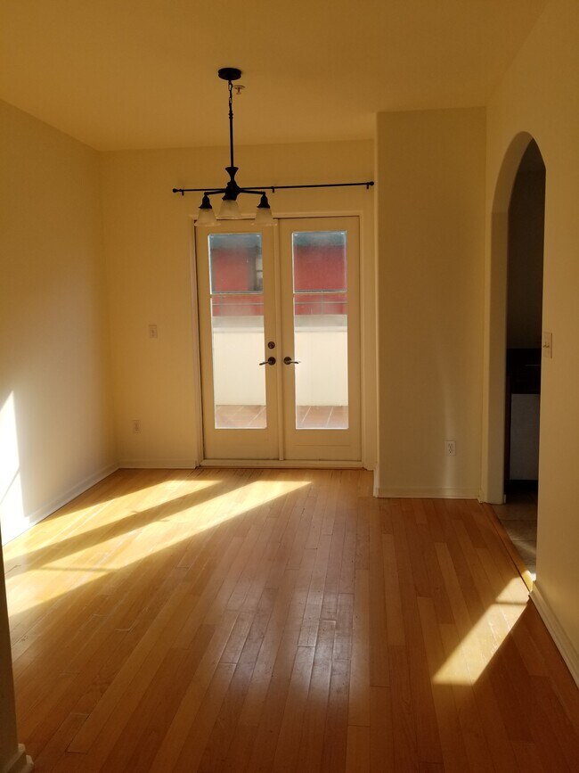 Dining area with French doors that lead to huge deck - 809 Meridian Ave