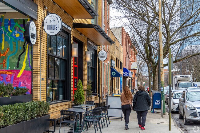 Residents enjoy the local businesses that line Powelton's Streets.
