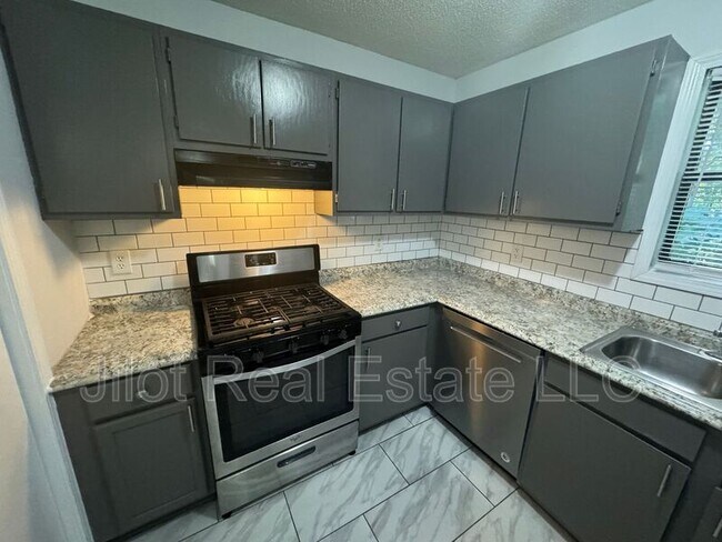 Foto del edificio - 5629 Windwood Rd.