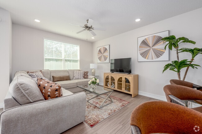 3BR, 2.5BA - 2,139SF - Living Room - Lake Tavares Townhomes
