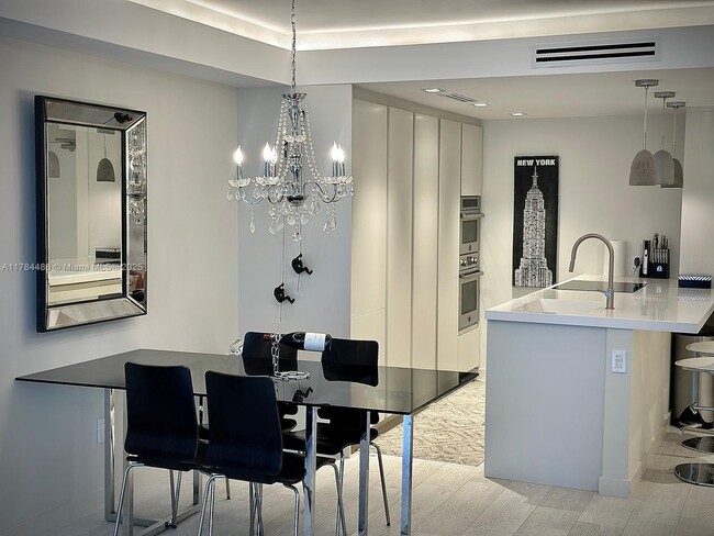 Building Photo - 5600 Collins Ave