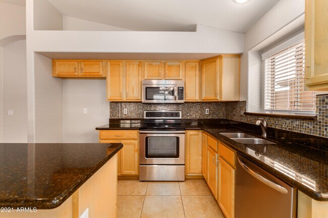 Foto del edificio - 11455 E Peterson Ave
