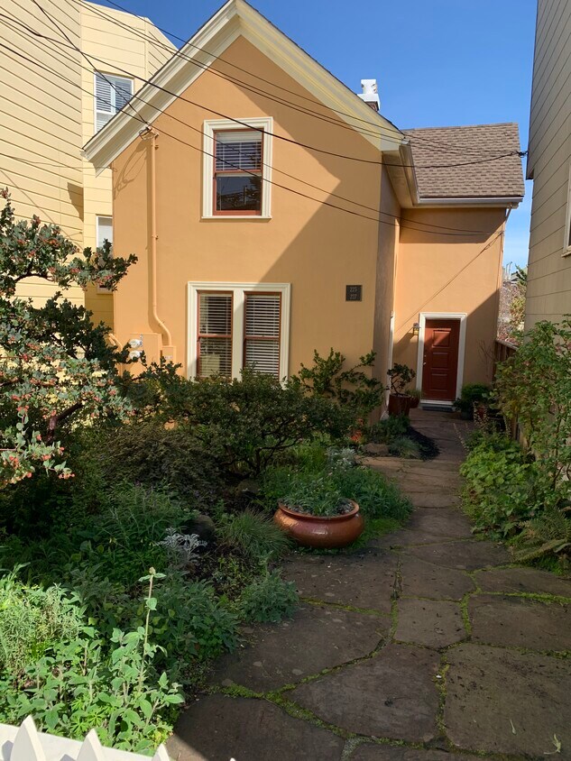 Large front yard with native garden, separate entrance to unit. - 225 Eureka St