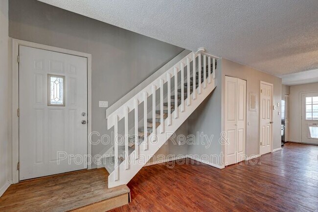 Building Photo - 9679 W Chatfield Ave