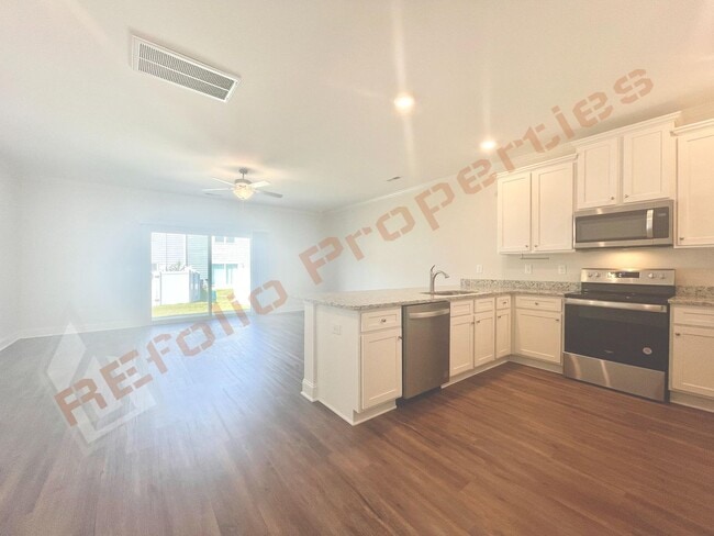 Foto del edificio - 6945 Outfall Point Ln