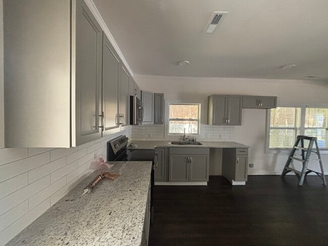 Building Photo - 1430-1413 13th Pl S