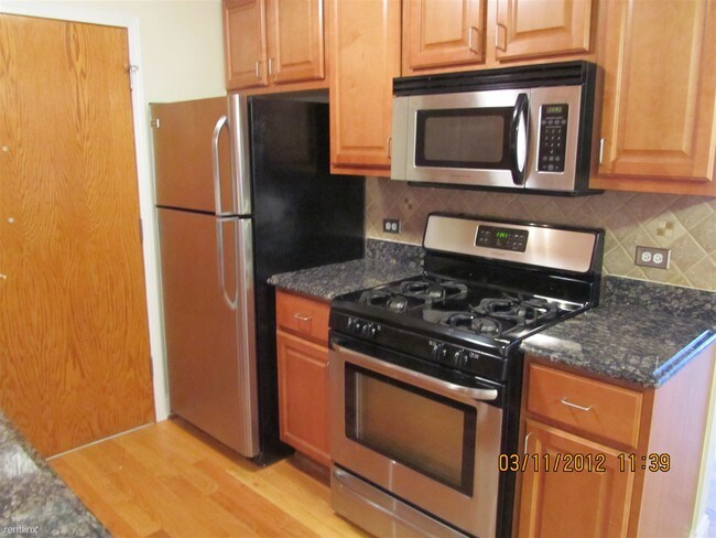 Building Photo - 1 br, 1 bath  - 4929 N East River Rd Unit 2A