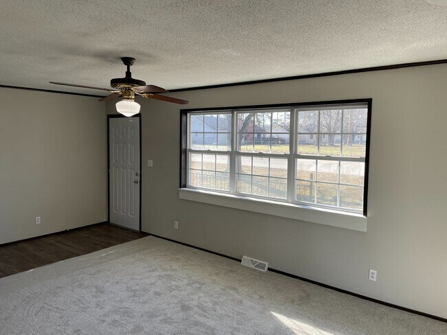 Building Photo - Rogersville Living at a great price .