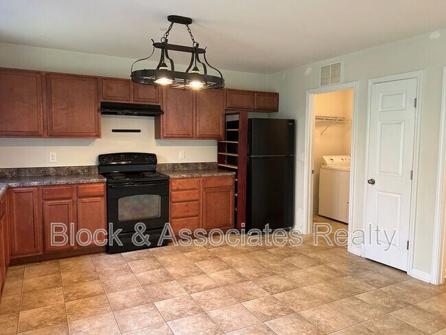 Foto del edificio - 5147 Fiddlers Run Dr