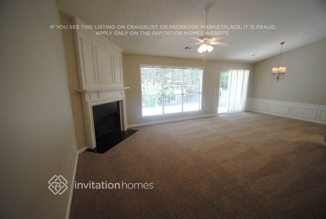 Building Photo - 6050 Carriage Park Way