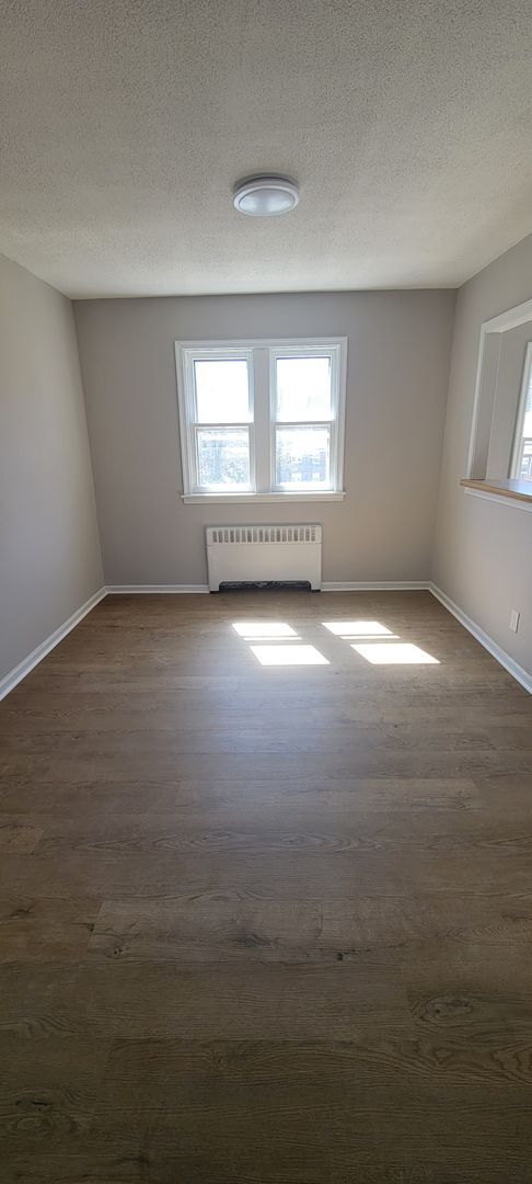 Building Photo - "Chic 1-Bedroom Condo: Your Ideal Home in ...