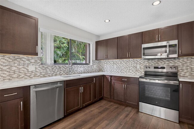 Building Photo - 587 NW 38th Ave