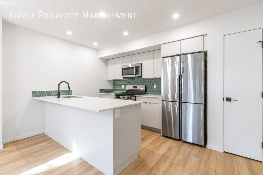 Primary Photo - Modern 3 Beds, 2.5 Baths Main Floor/ Upper...