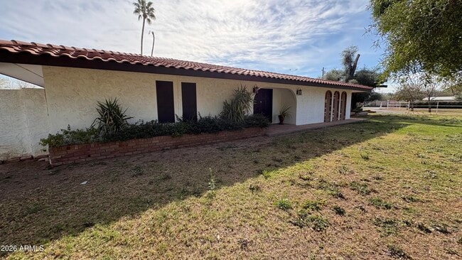 Building Photo - 9427 S 51st Dr