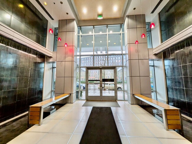 Building Photo - Exquisite Condominium at the Renowned Waterfront Pearl with Views of the River, Work Out Facility...