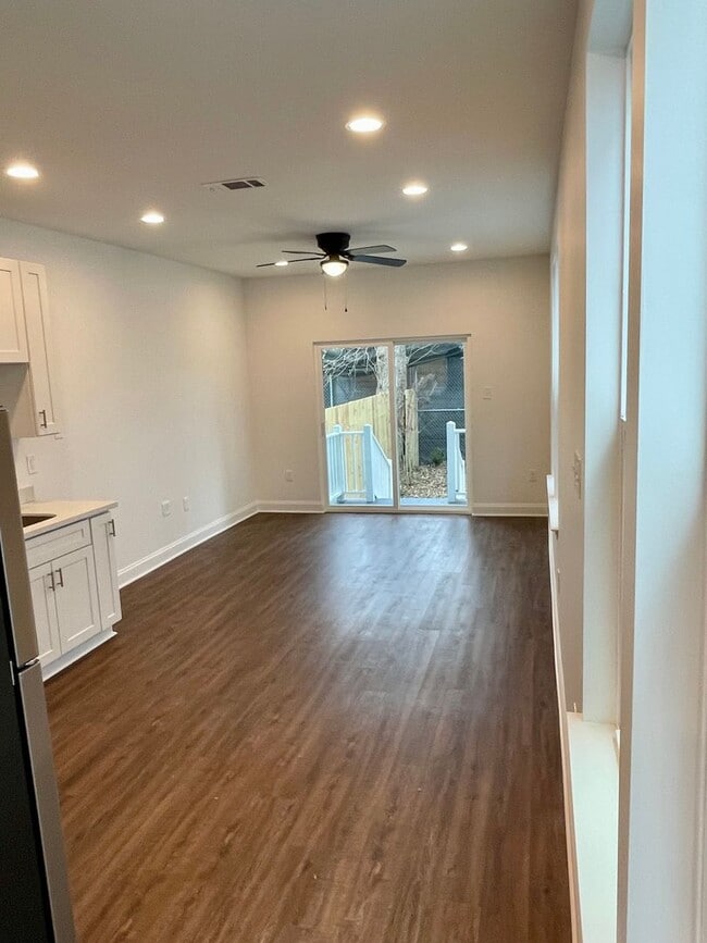 Photo - Newly Renovated 2BD/2.5BA with covered Driveway and Backyard Townhome