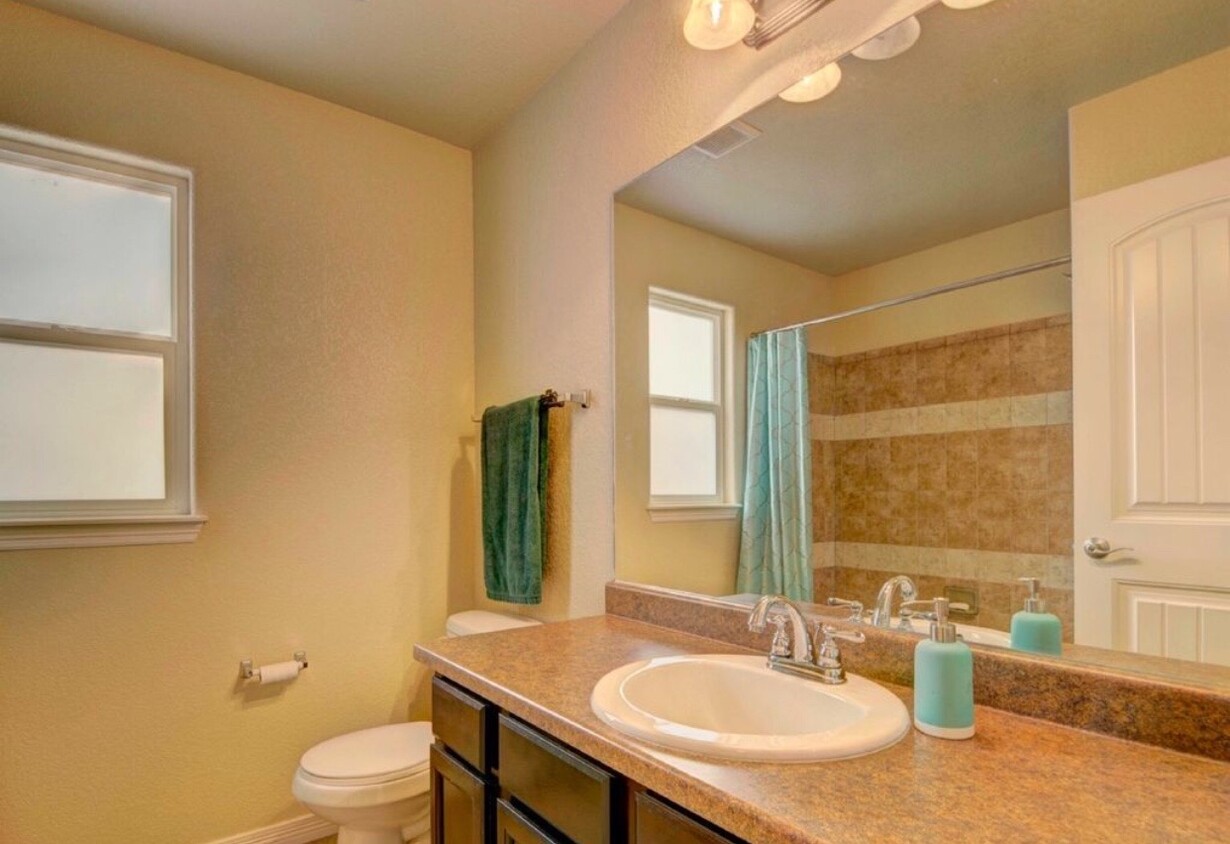 Full bathroom located upstairs - 7916 Lightwood Way