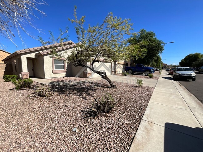 Building Photo - 11580 W Duran Ave