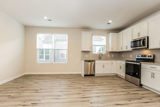 Building Photo - Welcome to your new home with Evernest! Si...