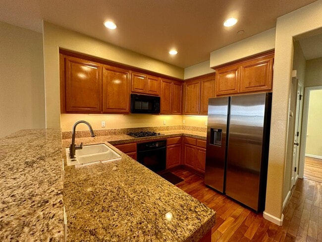 Building Photo - TOWNHOME WITH THOUGHTFUL UPGRADES | CALM SETTING