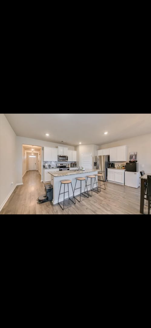 Foto del edificio - Cozy 4bedroom Home