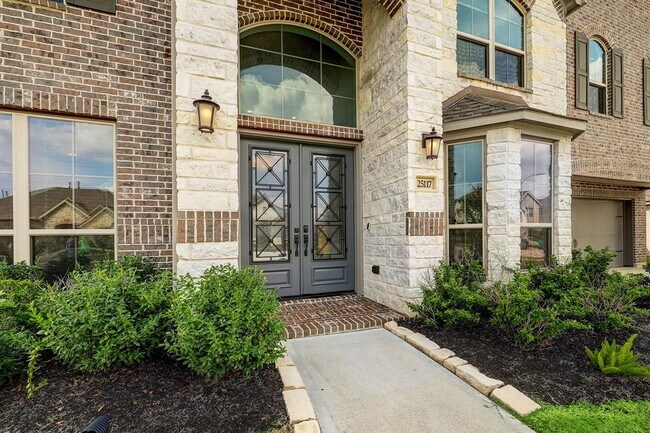 Foto del edificio - 25117 Pinebrook Grove Ln