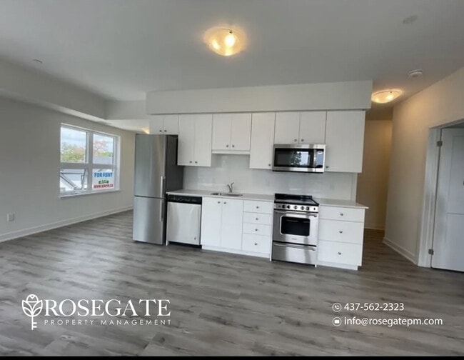 Photo du bâtiment - Corner 1+Den Condo with Private Balcony & Parking in Kitchener