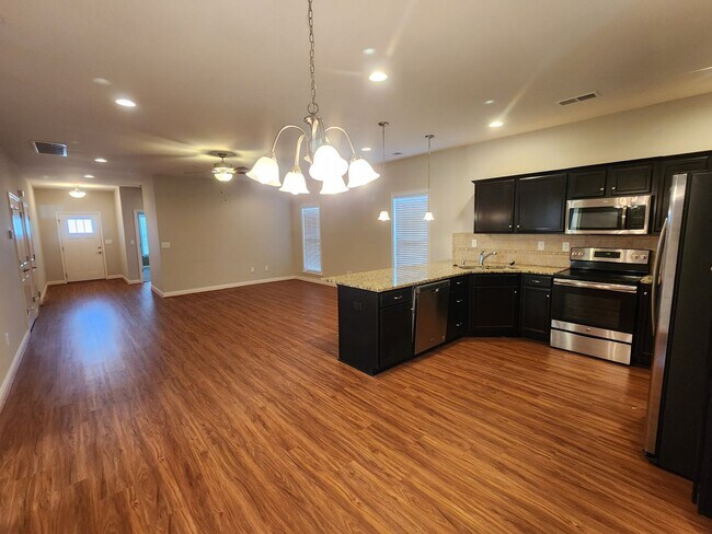 Foto del edificio - Beautiful garden ranch home with an open f...