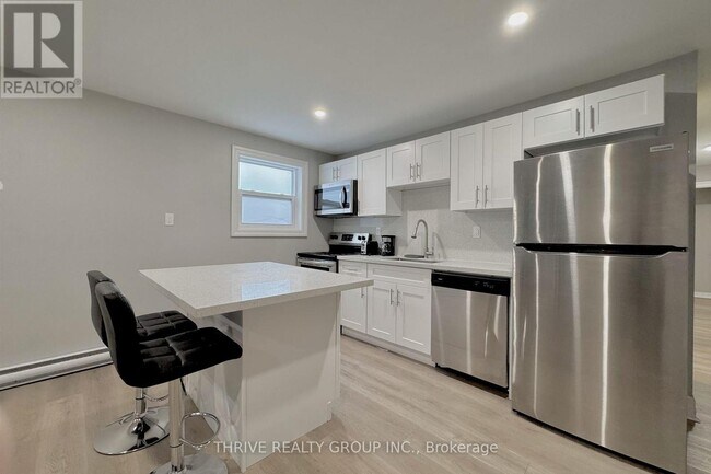 Photo du bâtiment - 100 King Edward Ave