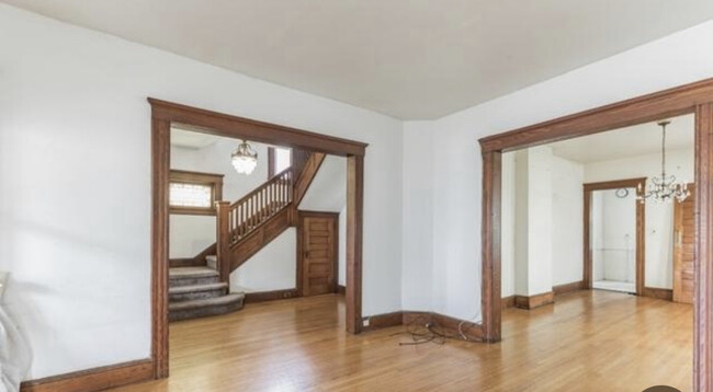 Entry and view of stairs, closet - 499 Highland Ave