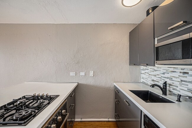 Building Photo - Stylish Capitol Hill Condo with Mountain &...