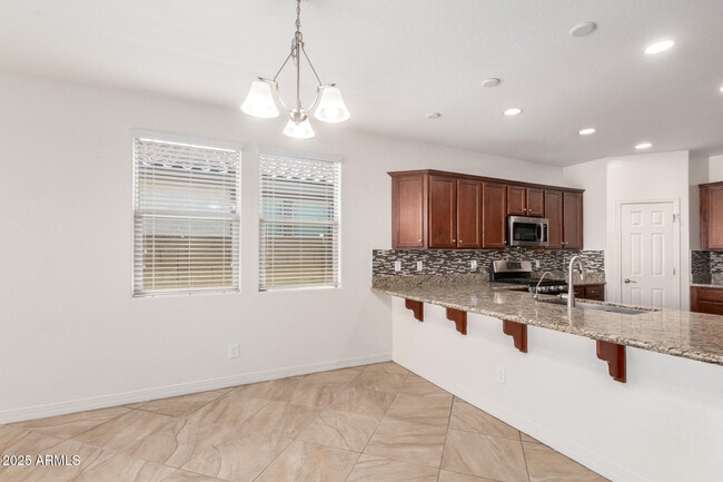 Building Photo - 10119 W Los Gatos Dr