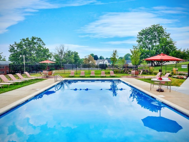 Resort Pool with Sundeck - The Bradford Apartment Homes