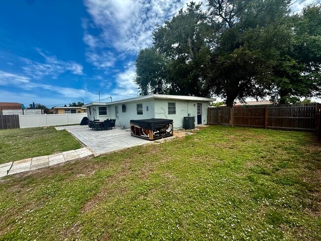 Building Photo - Charming Coastal Cottage with Huge Fenced Yard & Smart Tech!