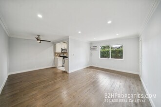 Building Photo - 7571 Willoughby Ave