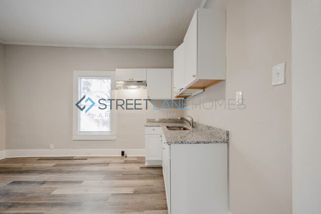 Building Photo - NOW OFFERING HALF OFF THE FIRST FULL MONTH...