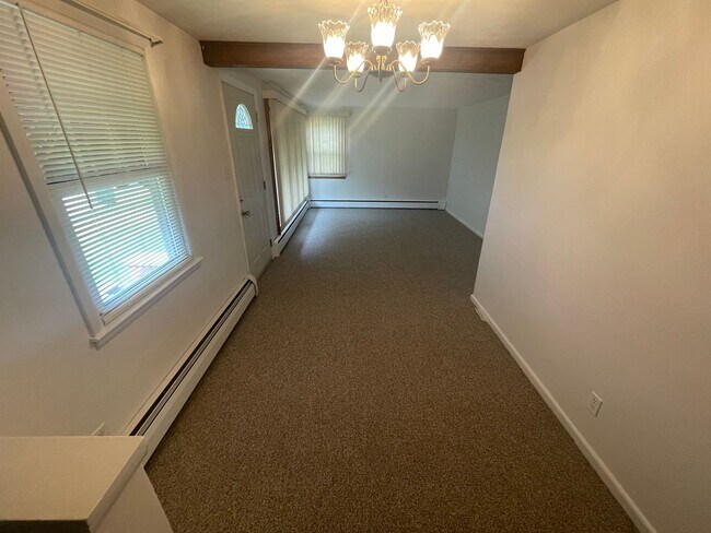 Building Photo - Charming 3-Bedroom Home with Backyard & Of...