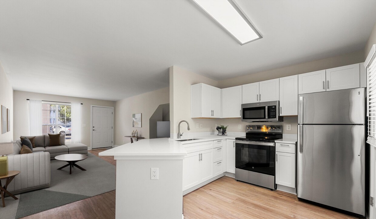 Las cocinas de concepto abierto son ideales para recibir a amigos y familiares. - Peachtree Park