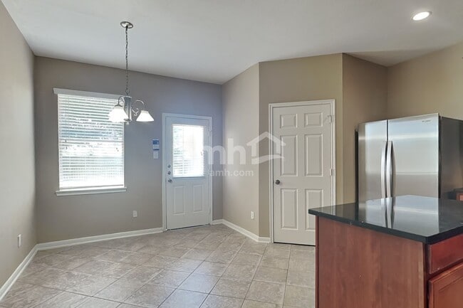 Building Photo - 7418 Jacobs Well Dr