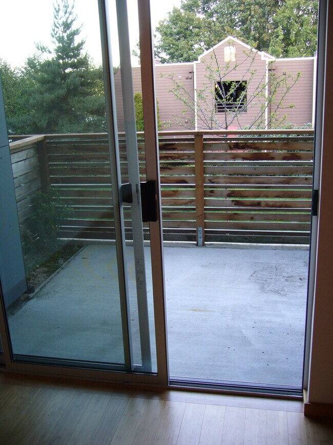 Fenced and partially covered patio - 566 Galer St
