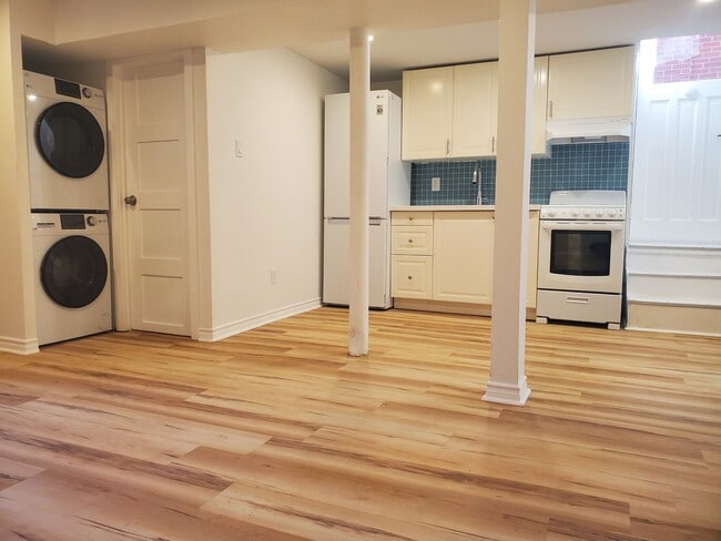 Building Photo - LARGE, very bright lower level loft apartment-  Available on April 1 is this beautiful, large and...